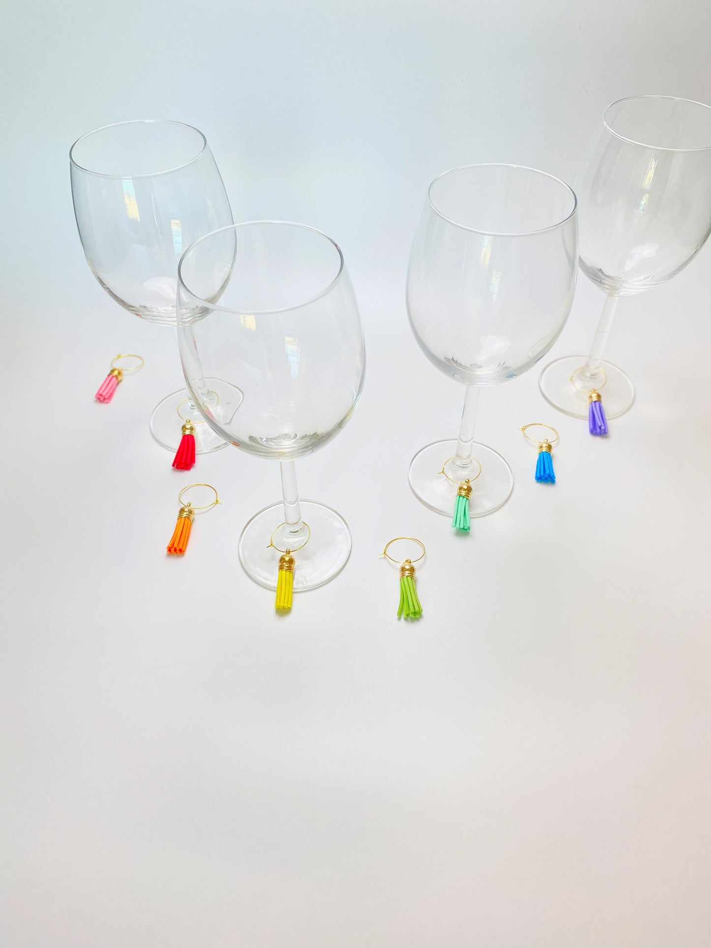 Faux leather rainbow wine charms on gold rings