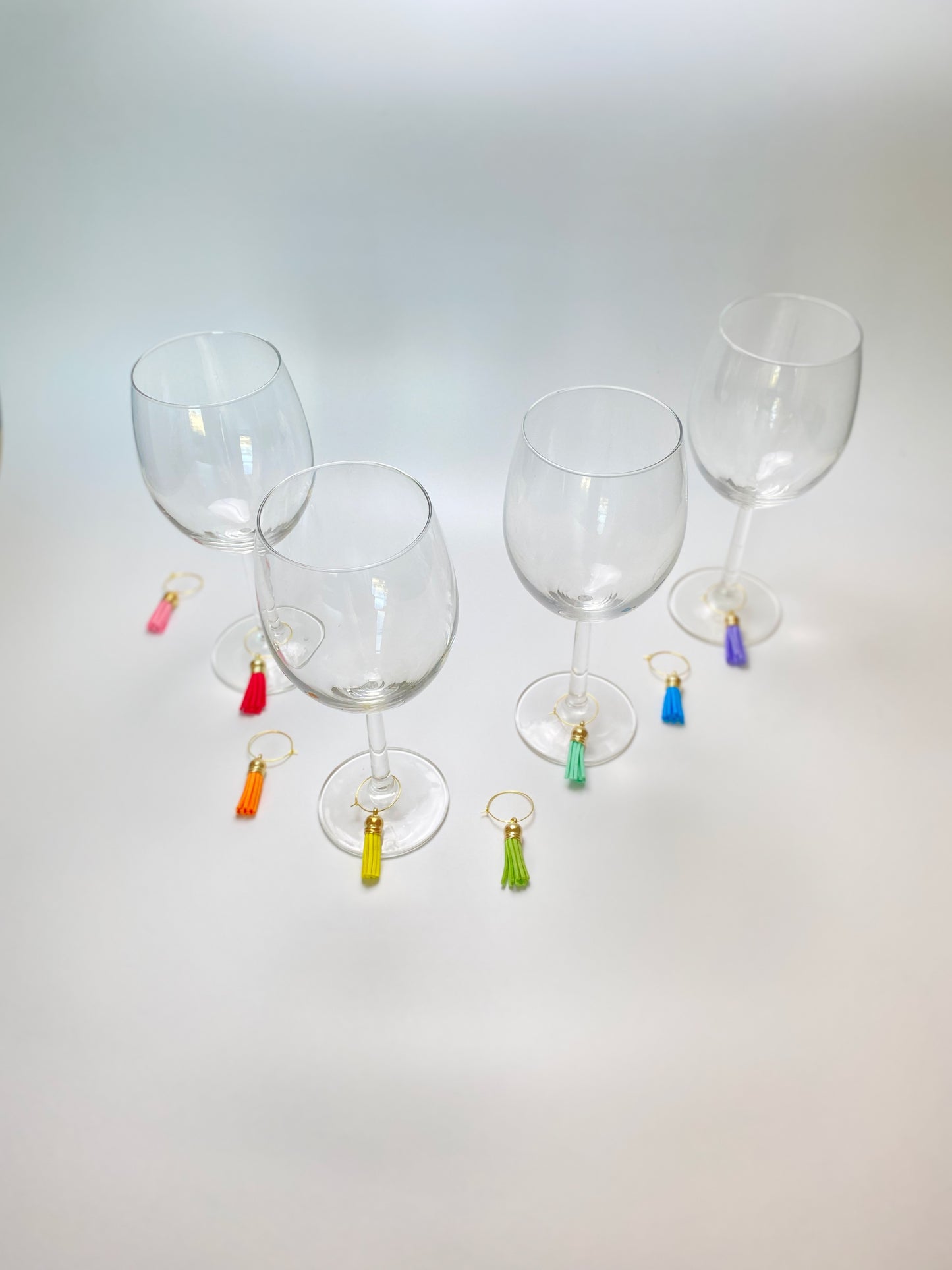 Faux leather rainbow wine charms on gold rings