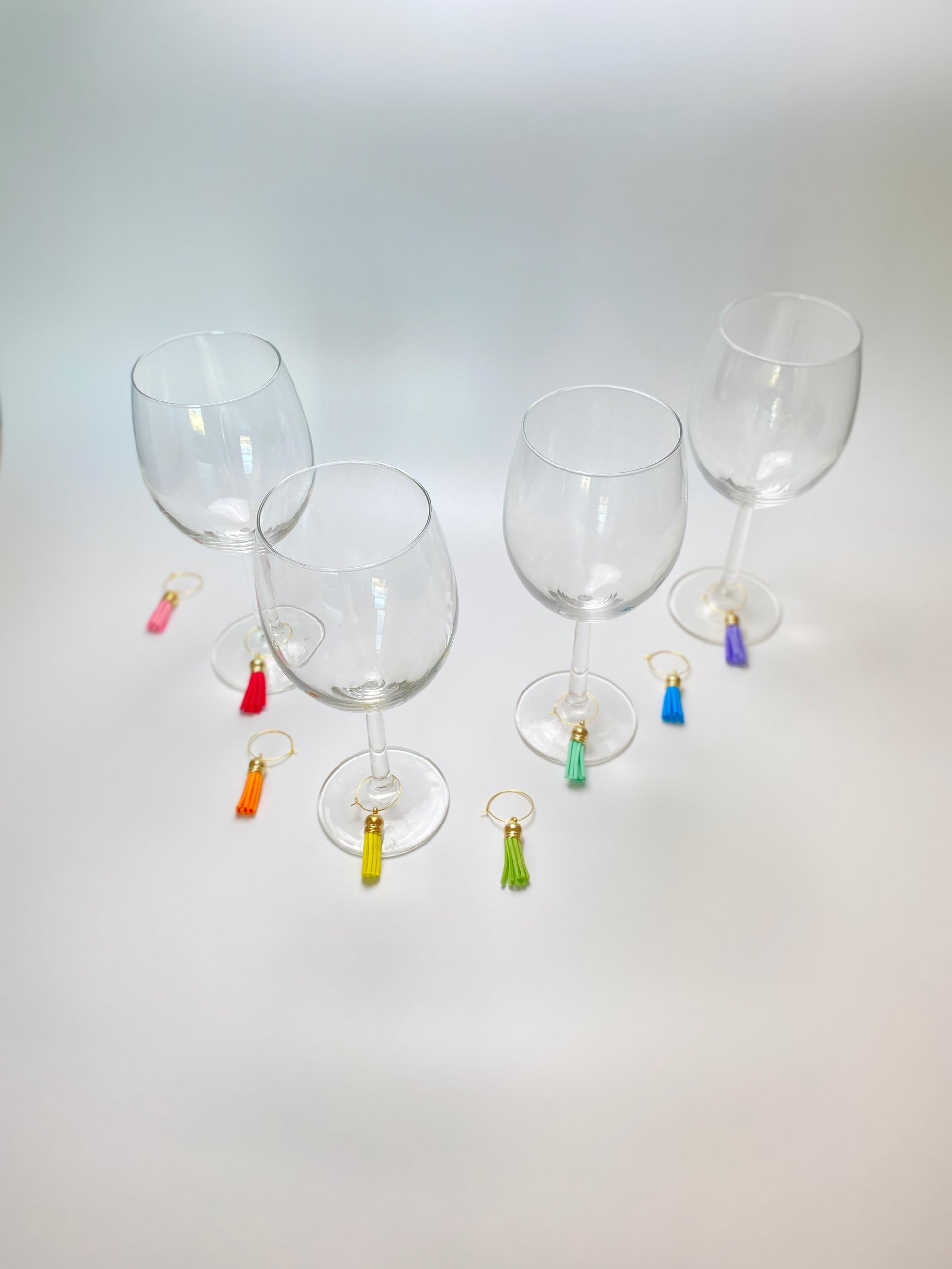 Faux leather rainbow wine charms on gold rings