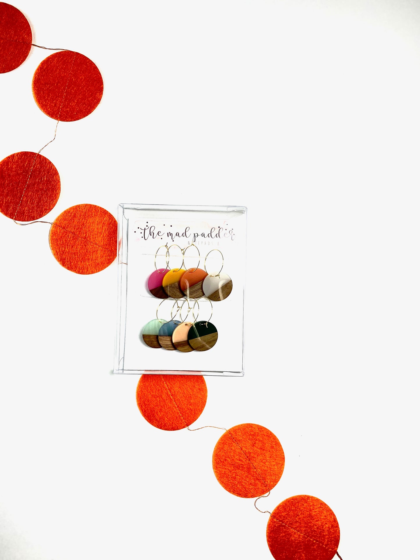 Colorful resin wood circle discs on gold wine charm rings